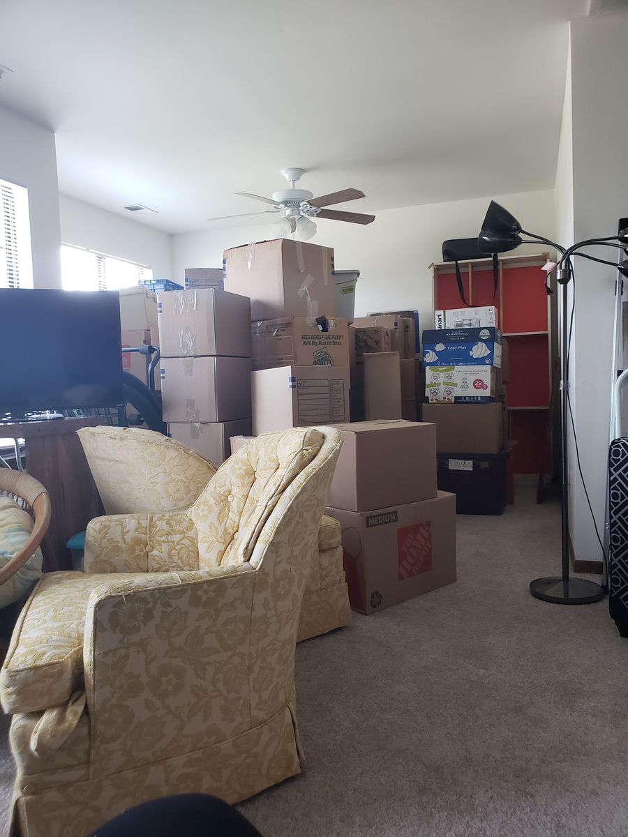 A Chicago home packed and ready for moving day with stacked, labeled boxes